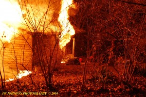 Front Corner Of House Thru Bushes