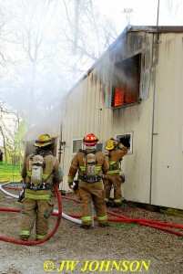 Fire Rolls Above House and FF`s