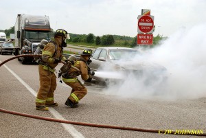 Nolan Kneels Down to Hit Fire