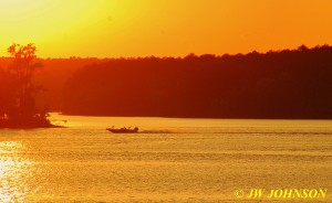 06 Speedboat Races Across Lake Sunset