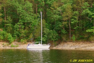 76 Sailboat Moored in Cove