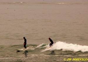 Surfer Rides The Waves 5
