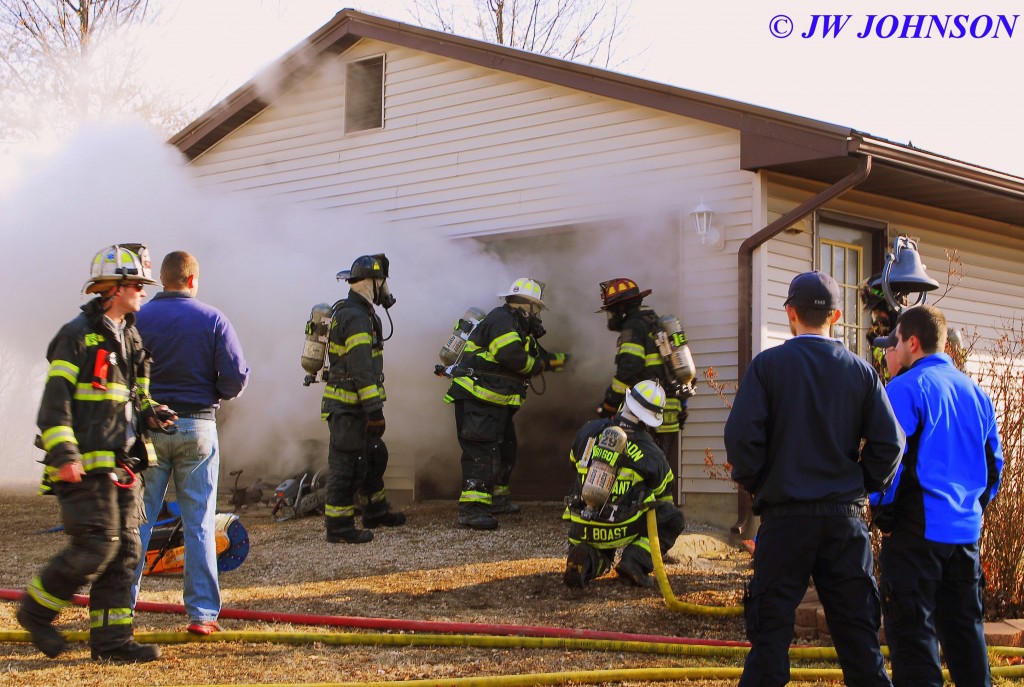 15 Entering Garage Door by Saw