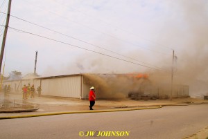 23 Flames Break Thru Facade Chief Calls for Truck