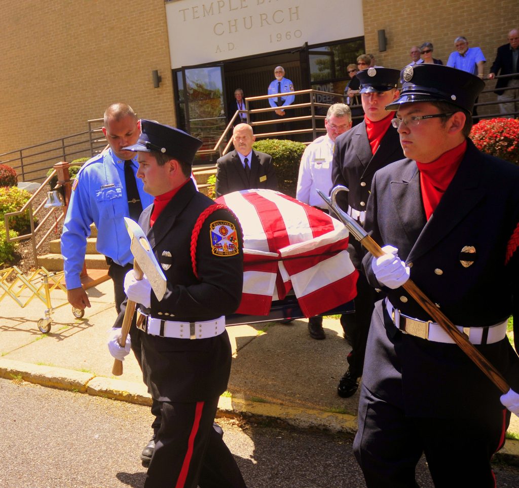 55 Carry Casket to Funeral Coach