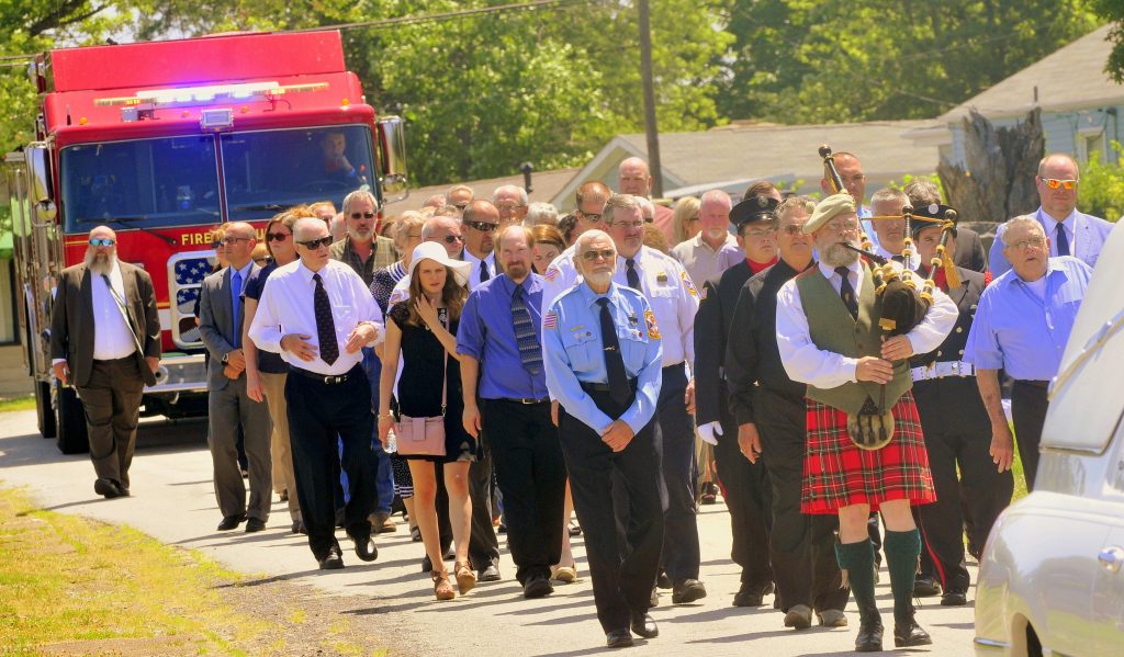 61 Procession Enters Cemetery