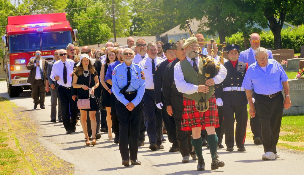 68 Procession Enters Cemetery