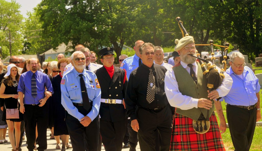 70 Procession Enters Cemetery